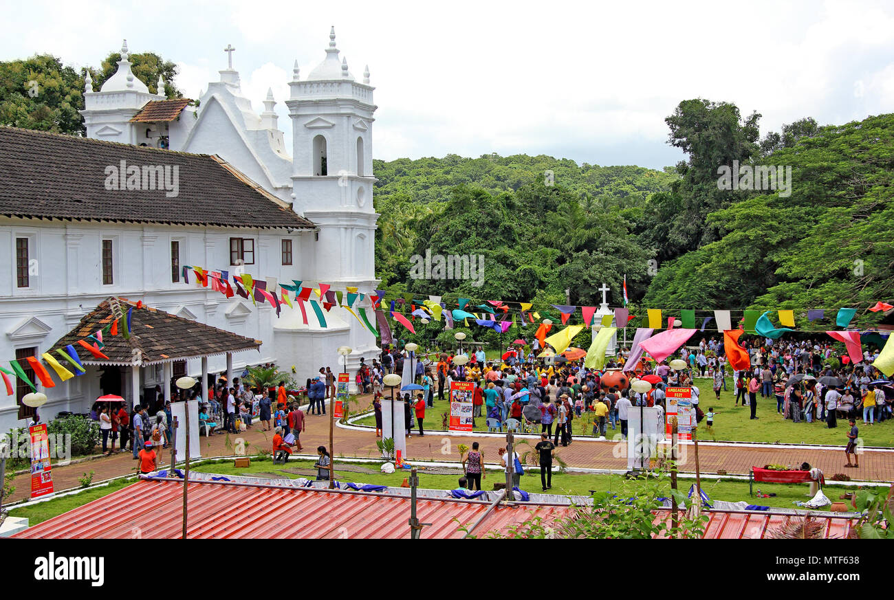 Locals and tourists participate in annual Patolienchem fest that showcases trades, crafts and culture of Goa at Our Lady of Succour Church in Socorro, Stock Photo