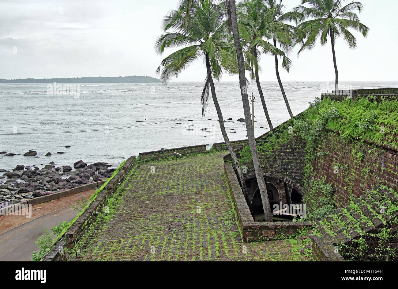 Mandovi River side structures and sea view of Portuguese period Reis Magos Fort in Goa, India. Stock Photo