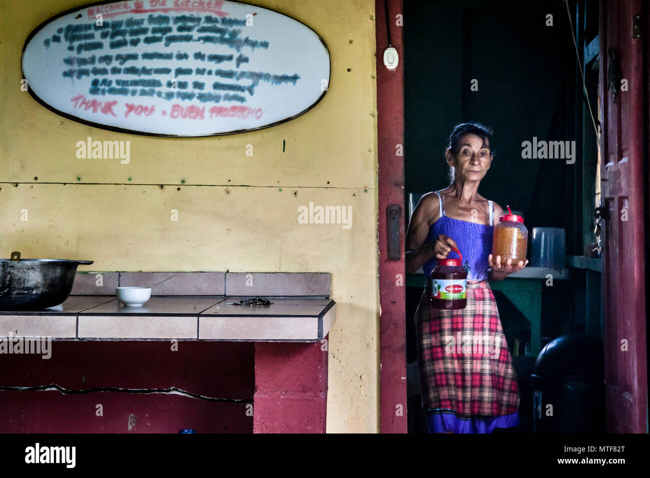 Housekeeping in Costa Rica. The high humidity and the fragrant fumes from the kitchen have made the writing on the blackboard illegible. Carmelina doesn't care. She lives nearby and cooks for the guests of the research station for the duration of the project Stock Photo