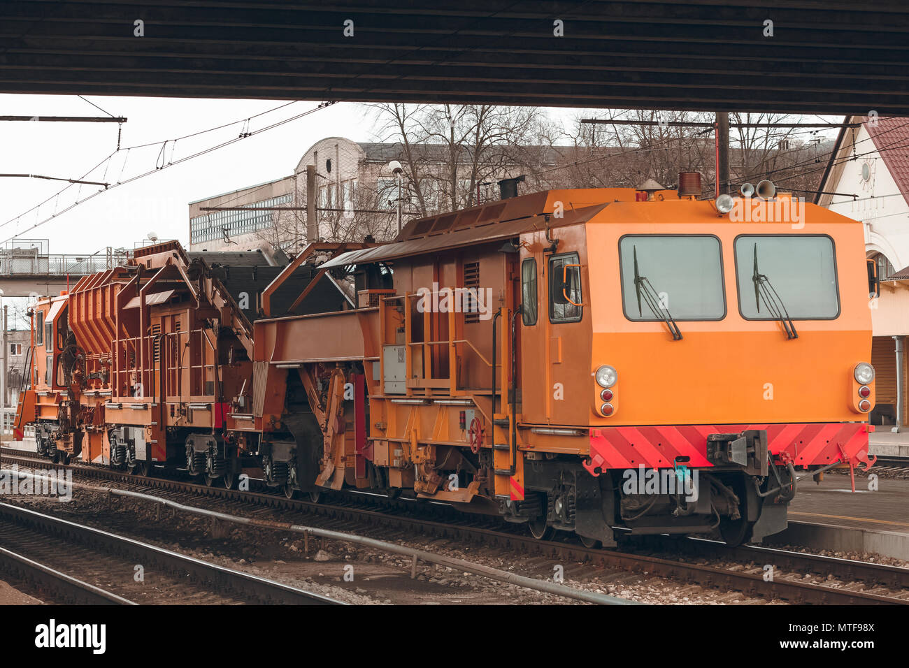 Ballast distributing and profiling track machine. Repair train Stock