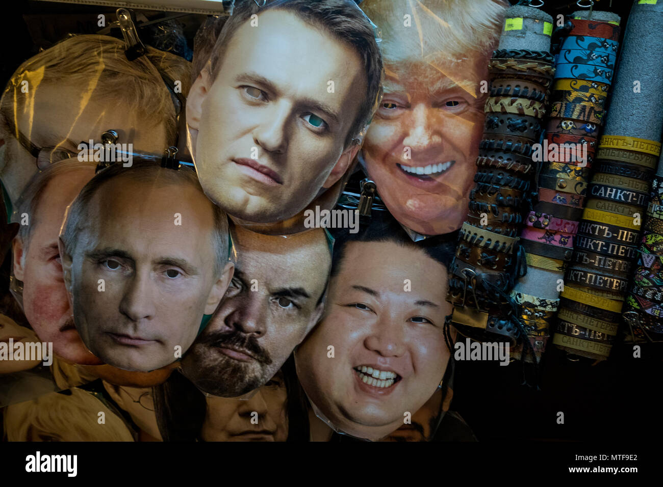 Masks of Vladimir Putin, Alexei Navalny, Vladimir Lenin, Donald Trump, Kim Jong-un lie on the counter of a souvenir stand on Nevsky avenue in St. Pete Stock Photo