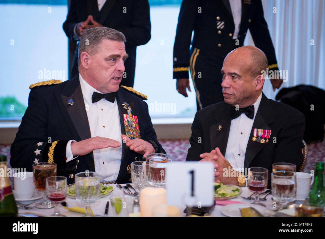 U.S. Army Chief of Staff Gen. Mark A. Milley speaks with retired Brig. Gen. Earl Simms during the 43rd annual ROCKS Spring Gala and Awards Ceremony, Ft. Belvoir, Va., April 22, 2017. Stock Photo