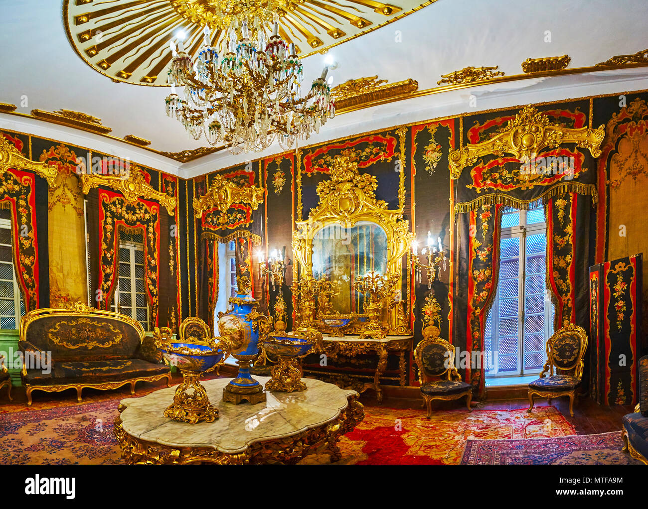 CAIRO, EGYPT - DECEMBER 24, 2017: Panorama of Aubusson Room in Throne Manial Palace with outstanding decoration, historical textiles, furniture, chand Stock Photo