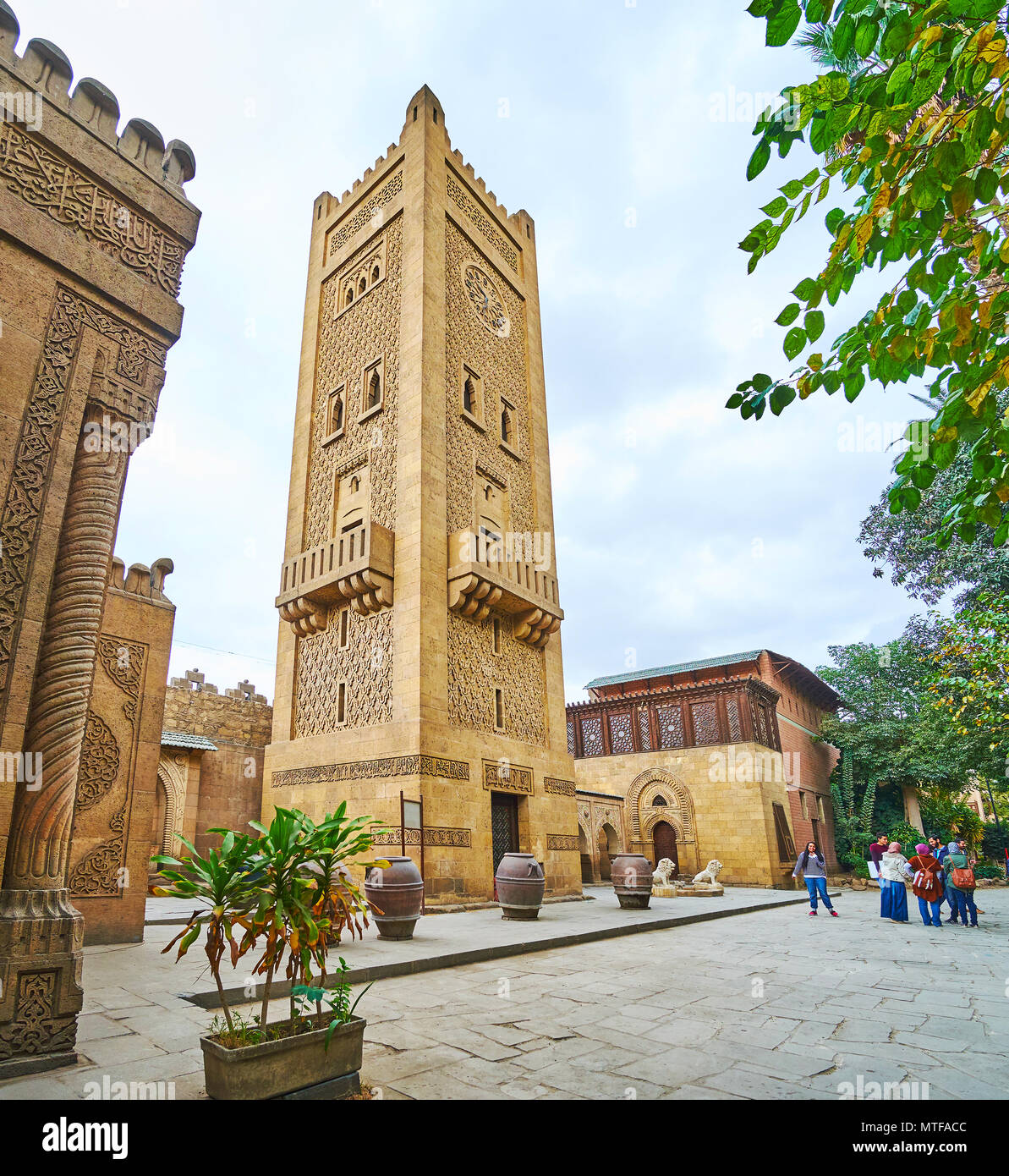 CAIRO, EGYPT - DECEMBER 24, 2017: The beautiful stone Moroccan minaret of the mosque of Manial Palace, famous for its unusual architecture, on Decembe Stock Photo