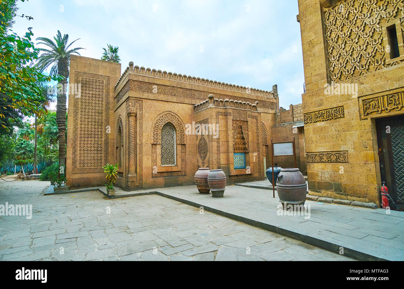 The old mosque of Manial Palace boasts outstanding architecture, intricate carved patterns on its stone walls, Cairo, Egypt. Stock Photo