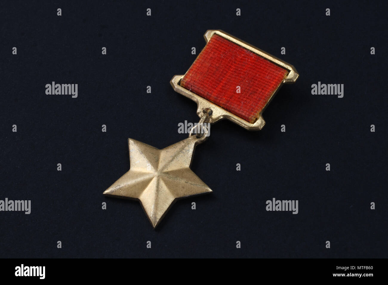 The Gold Star medal is a special insignia that identifies recipients of the title 'Hero' in the Soviet Union Stock Photo