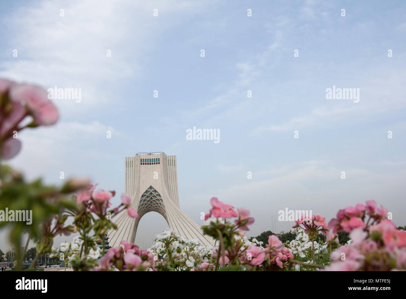 TEHRAN, IRAN 7 May 2018. The Azadi Tower behind pink and white