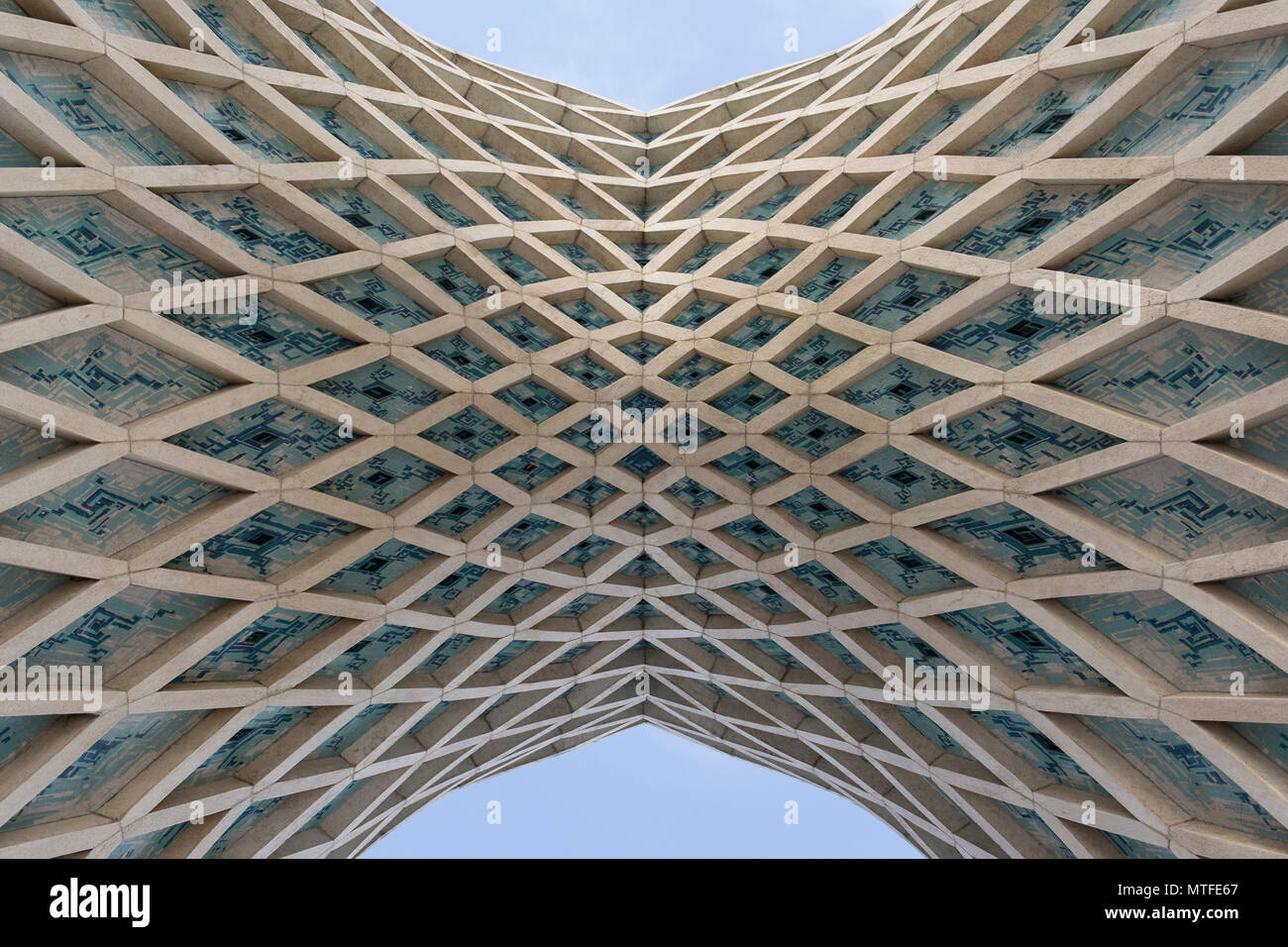 TEHRAN, IRAN - 7 May  2018 Top part of Azadi tower gates detail connected  bridge, Islamic pattern architecture. Stock Photo