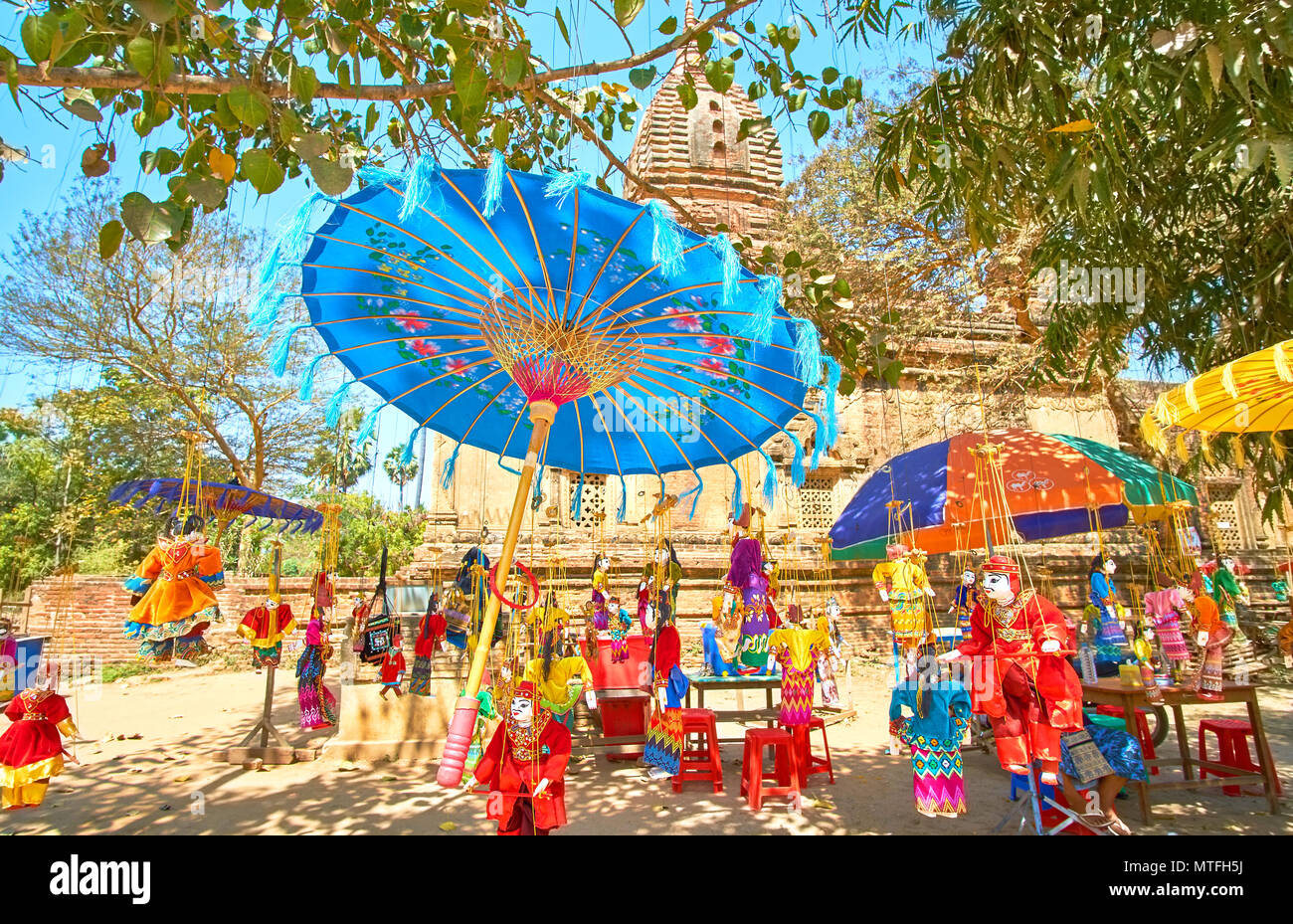 The burmese style umbrellas are one of the most popular objects in souvenir markets made from different materials, such as cloth, papper and bamboo, B Stock Photo