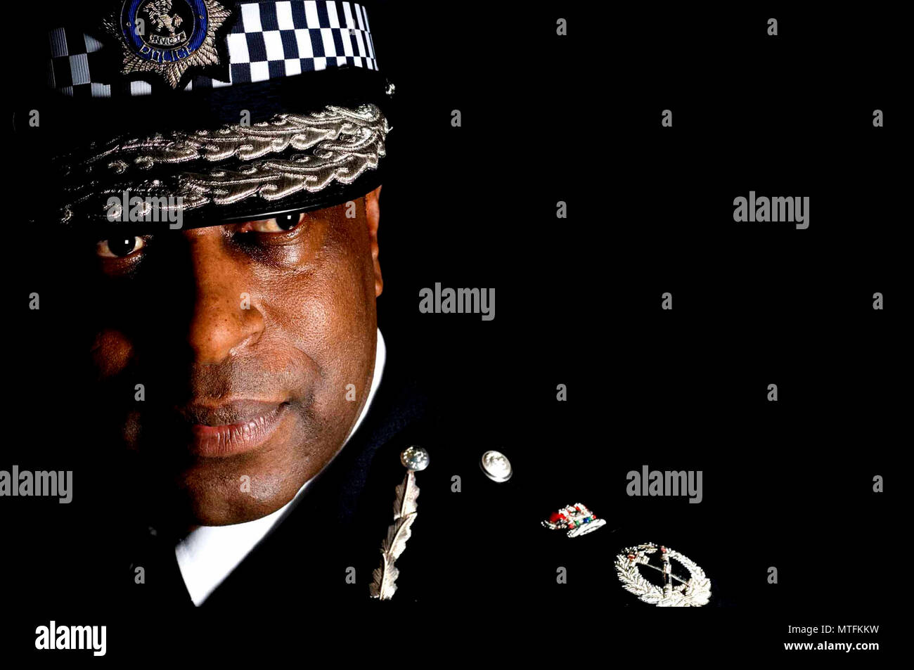 Michael Fuller, QPM is a former Chief Constable of Kent Police. He was the first ethnic minority chief constable in the United Kingdom and the first black officer of chief constable-equivalent rank. Fuller took up his role as Chief Constable of Kent on 5 January 2004. He joined the Metropolitan Police Service in 1975 as a cadet and served in uninformed and CID positions throughout London. His service has included several postings at New Scotland Yard, including selection for Special Branch. Stock Photo