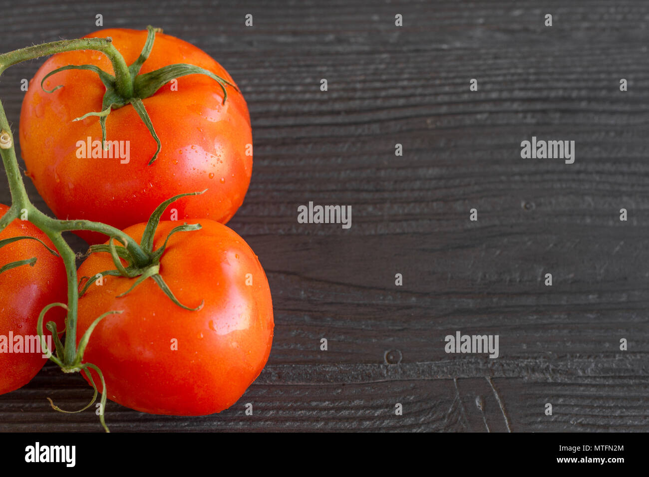 Vine Ripe Red Tomato, Organic produce, fruit, vegetable Stock Photo