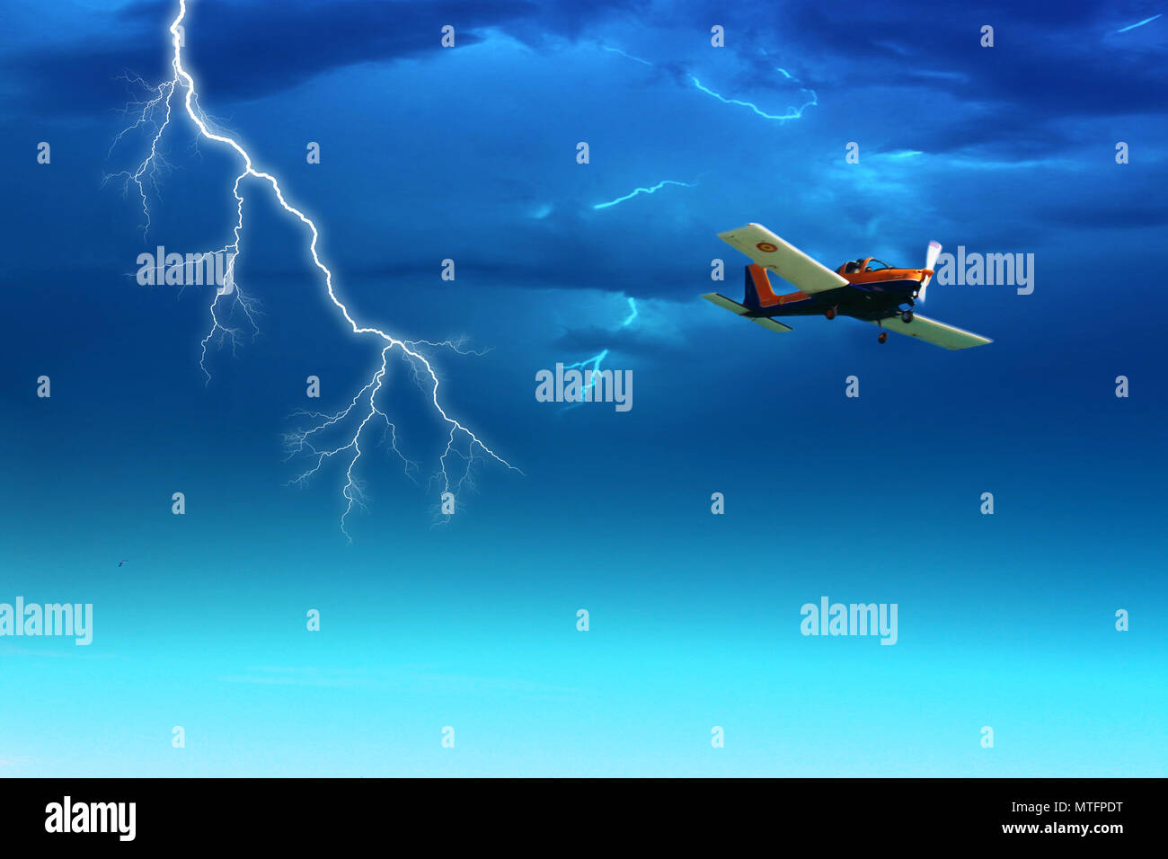 Small plane flying in a storm Stock Photo Alamy