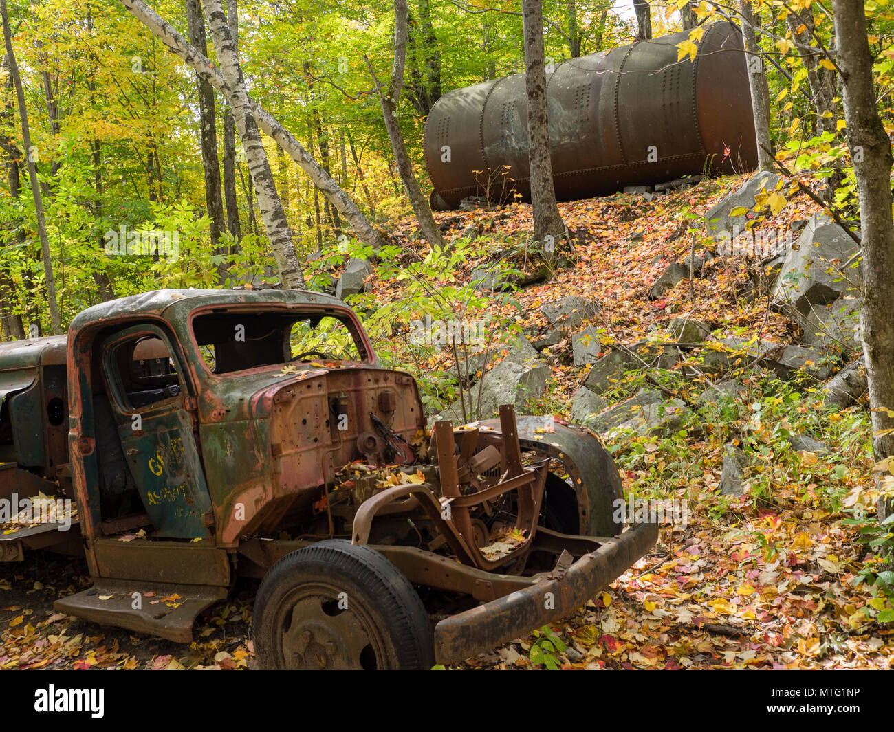 Rusted truck and tank at the Becket Land Trust Historic Quarry Stock