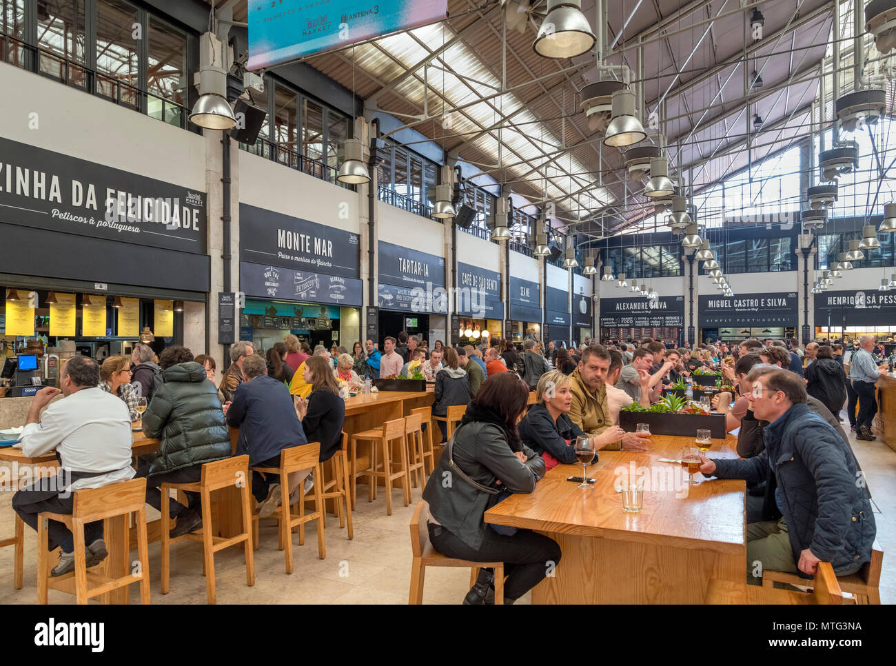 Cafes and bars in the Time Out Market food hall, Mercado da Ribeira, Lisbon, Portugal Stock Photo