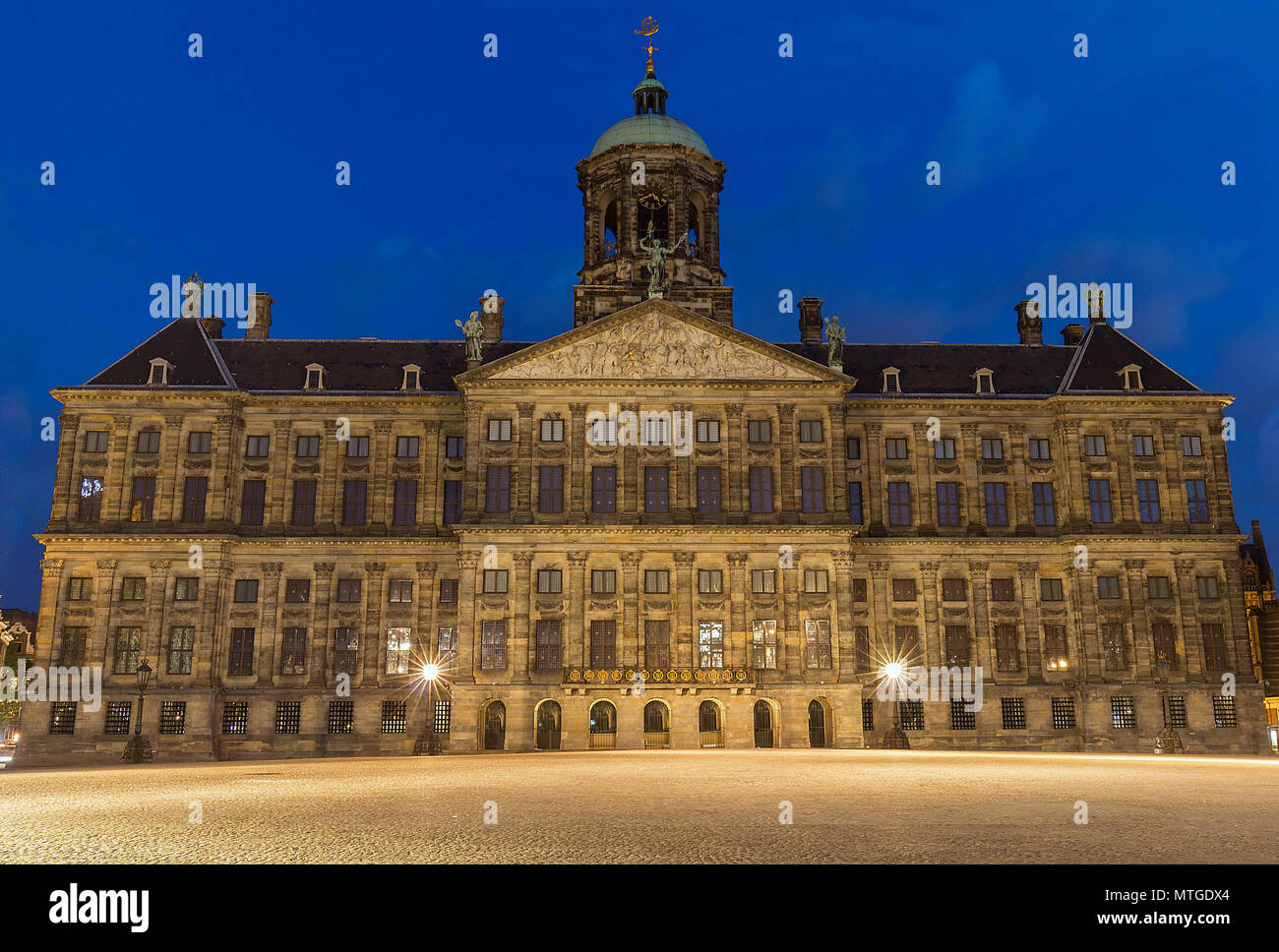 Royal Palace in Amsterdam on the Dam Square in the evening. Netherlands Stock Photo