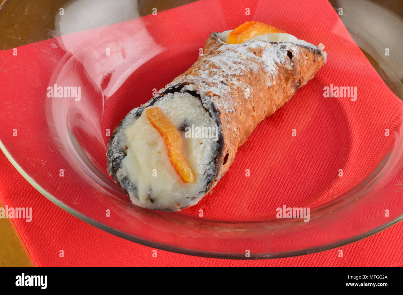 Dessert: Cannolo Siciliano .In a italian restaurant. Stock Photo