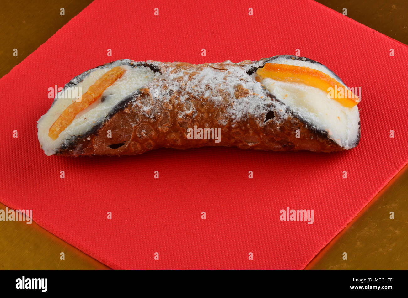 Dessert: Cannolo Siciliano . In a italian restaurant. Stock Photo