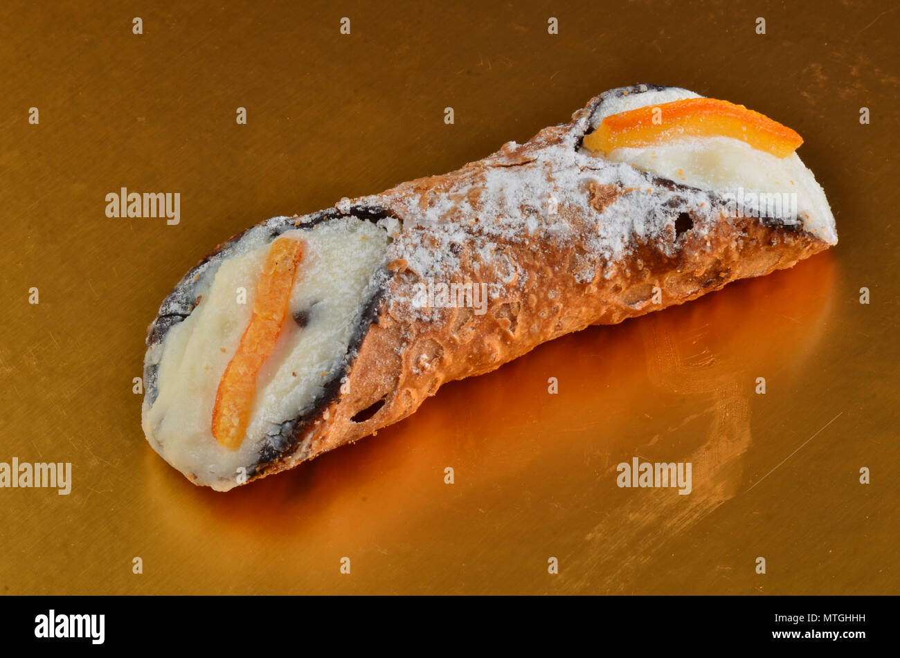 Dessert: Cannolo Siciliano . In a italian restaurant. Stock Photo