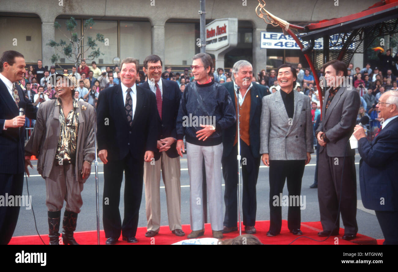 HOLLLYWOOD, CA - JUNE 12: (L-R) Actors Nichelle Nichols, William Shatner, Leonard Nimoy, DeForest Kelley, James Doohan, George Takei and Walter Koenig attend The Cast of 'Star Trek' Hand and Footprint Ceremony on June 12, 1991 at Mann's Chinese Theatre in Holllywood, California. Photo by Barry King/Alamy Stock Photo Stock Photo