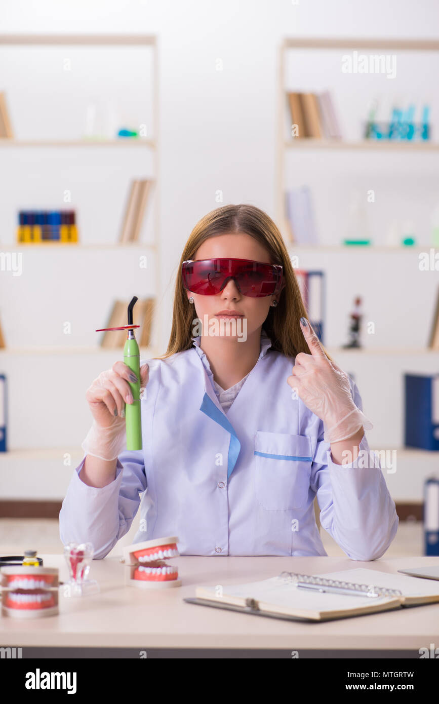 Dentistry student practicing skills in classroom Stock Photo - Alamy