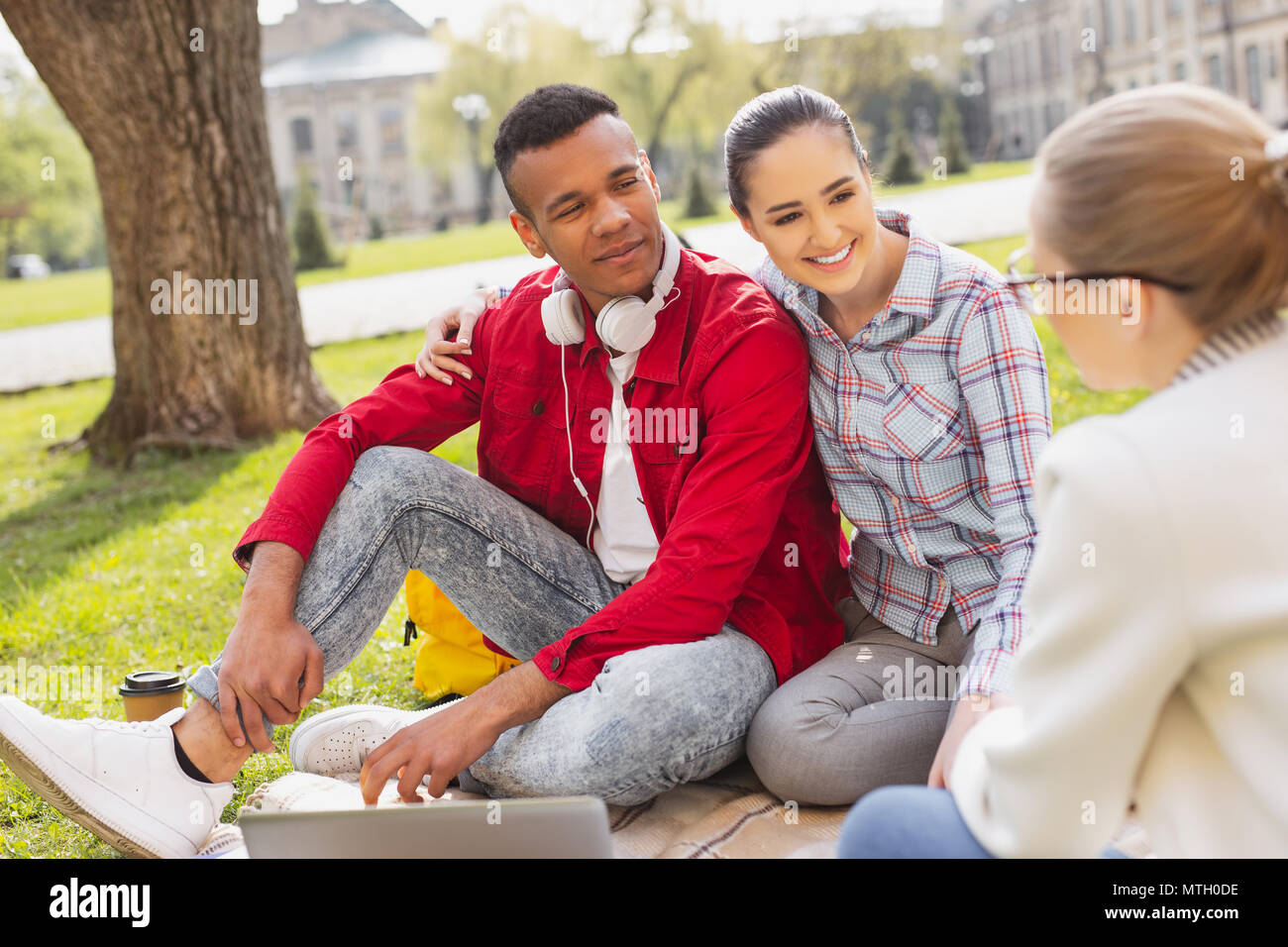 Couple of lovely students spending time together Stock Photo - Alamy