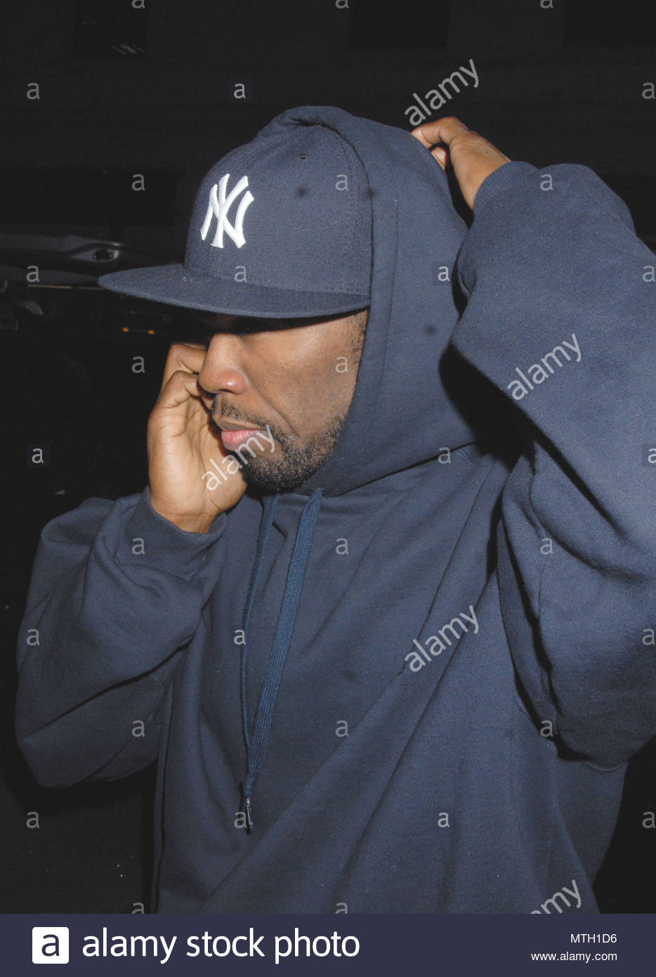 Cent Chatting On His Cellphone As He Arrives At The London Mayfairel During His Uk Tour In London England Cent Chatting On His Cellphone As He Arrives At The London Mayfairel During His Uk Tour In London England