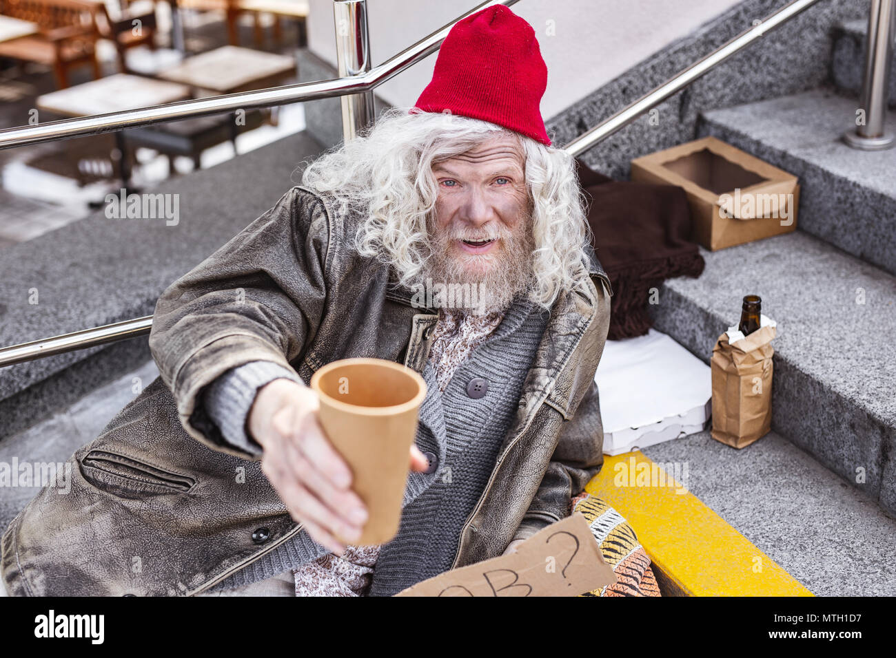 Poor aged man asking for money Stock Photo