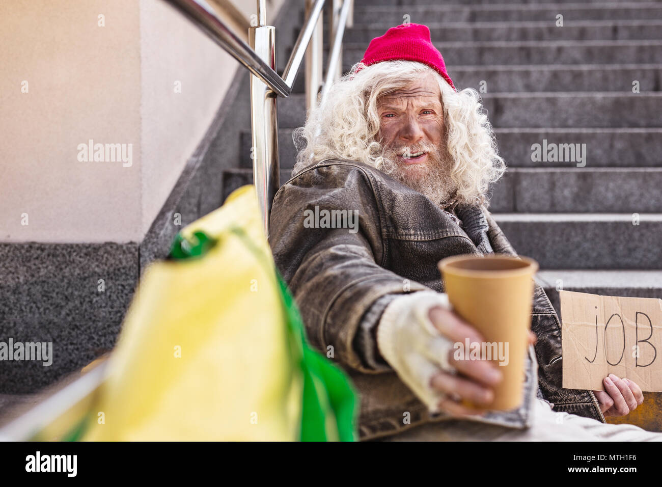 Aged bearded man being homeless Stock Photo