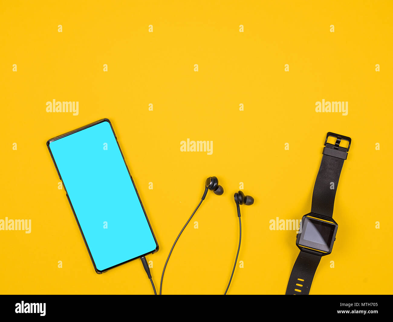 Flat lay top view of smartphone and smartwatch Stock Photo