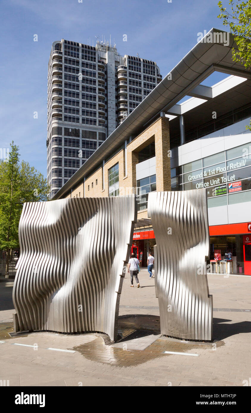 Modern art fountain and The David Murray John Building, the Brunel Tower, central business district of Swindon, Wiltshire, England, UK Stock Photo