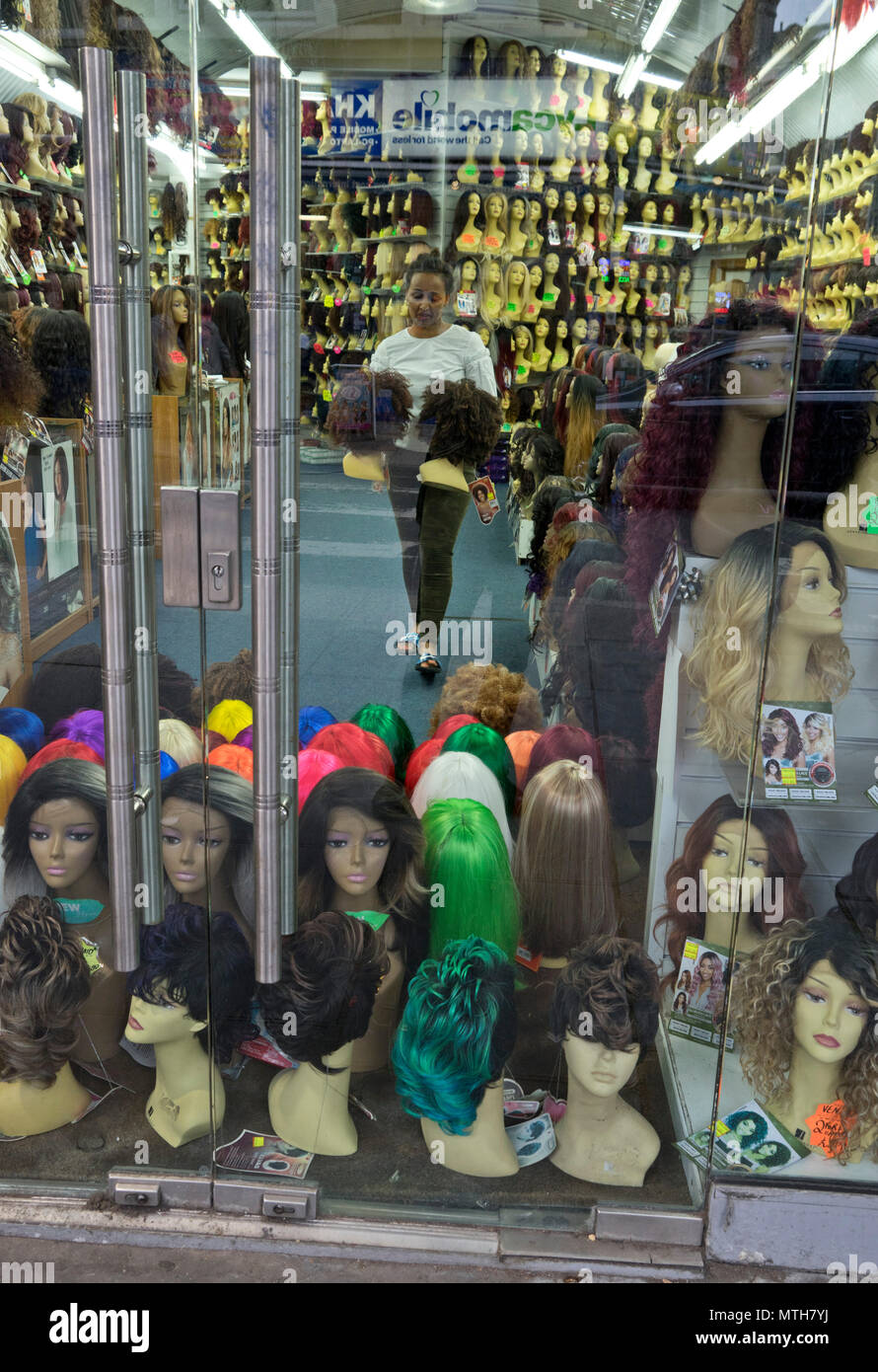 Beauty shop with women wigs by Brixton Pillars in railway arches near train  and underground station, being redeveloped to build luxury housing and new  shopping mall in London,England,UK Stock Photo - Alamy