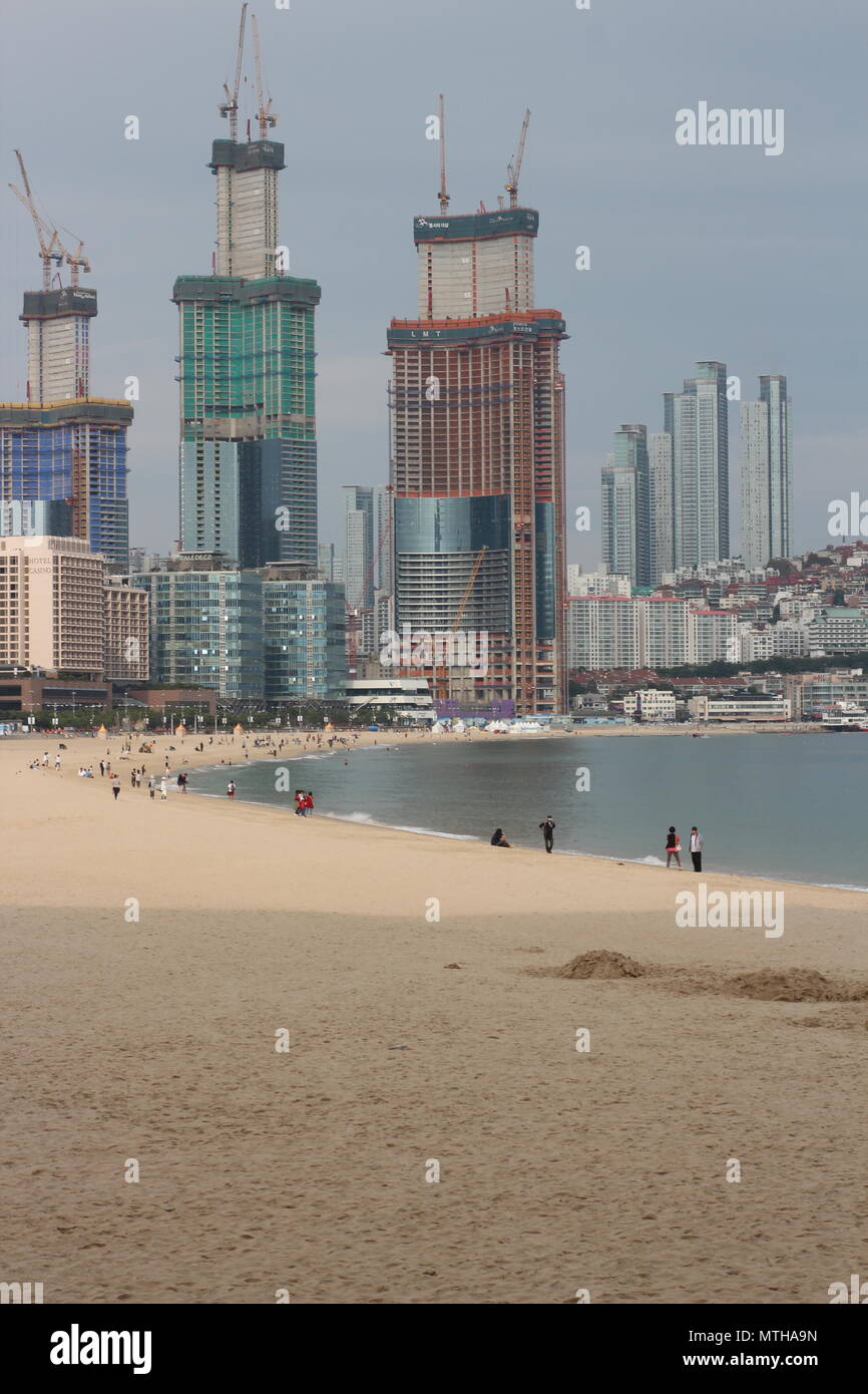 Busan, South Korea - Sept 7, 2017 : Haeundae beach, with the view of Haeundae LCT The Sharp under construction. Stock Photo