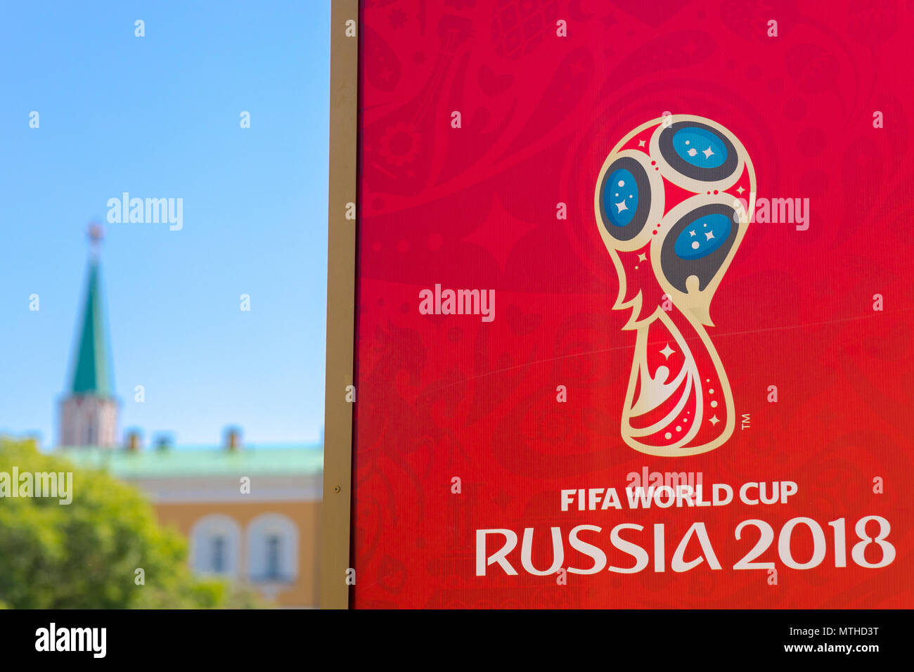 MOSCOW, RUSSIA - MAY 26, 2018: Official logo FIFA World Cup 2018 in Russia printed on a red background canvas, at Manezh Square. Kremlin and Manezh sq Stock Photo