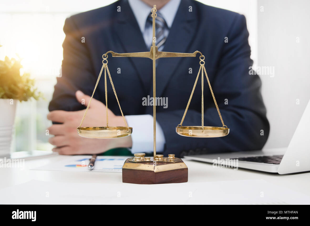 Justice symbol weight scales on table. Attorney working in office. Law attorney court judge justice legal legislation concept Stock Photo