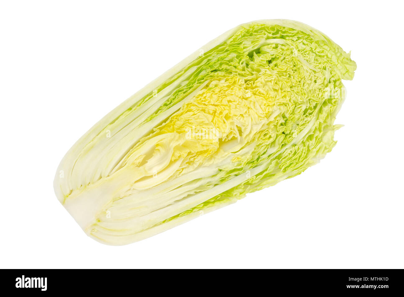 Napa cabbage half, Chinese cabbage, top view. Also nappa or wombok. Raw, fresh, uncooked and green vegetable. Brassica rapa Perkinensis Group. Photo. Stock Photo