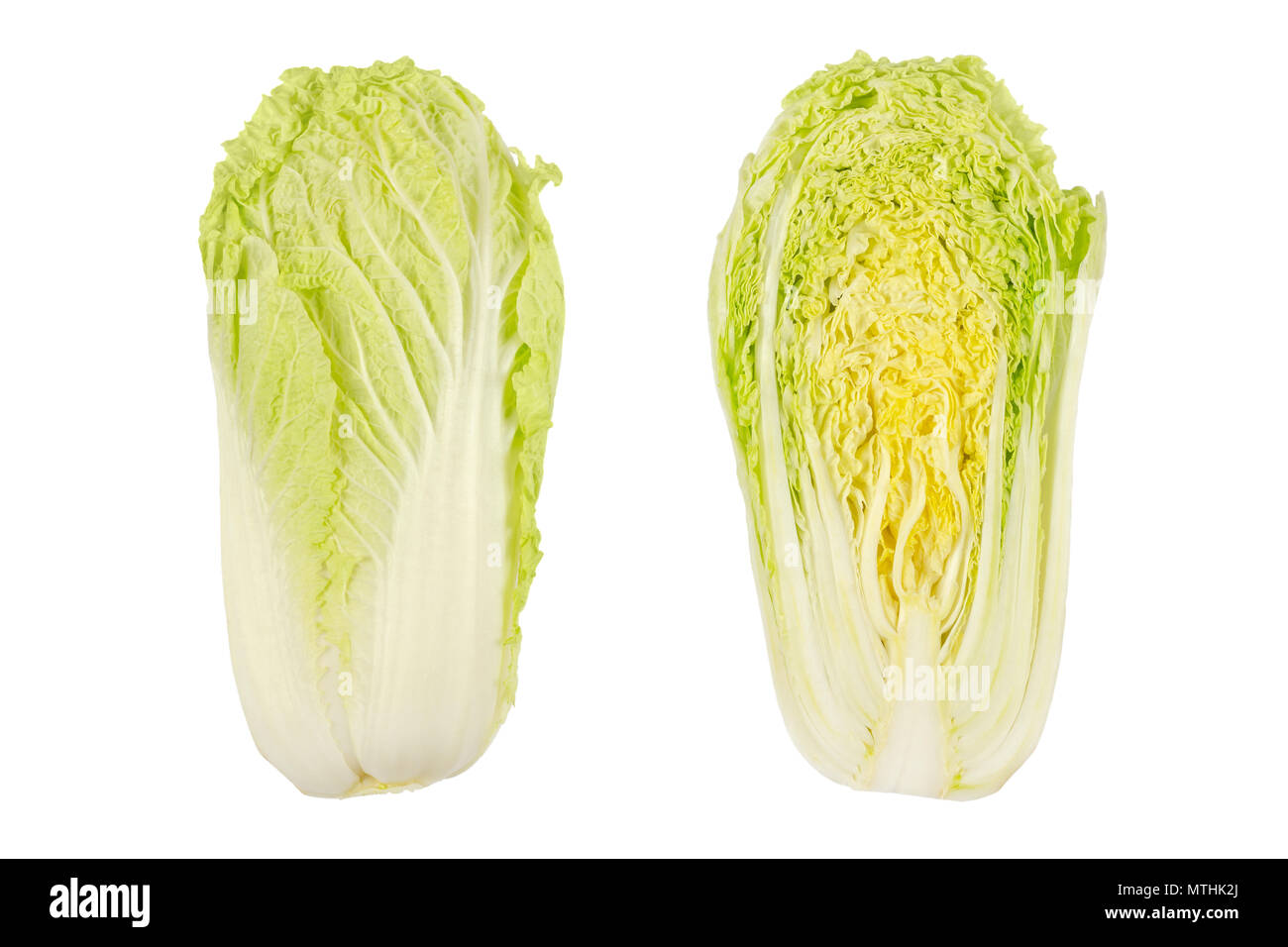 Napa cabbage, whole and half, Chinese cabbage, top view. Nappa. Wombok. Raw, fresh, uncooked, green vegetable. Brassica rapa Perkinensis Group. Photo. Stock Photo