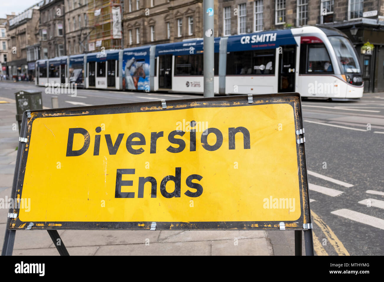 Diversion Ends sign and an Edinburgh Tram on Shandwick Place, Edinburgh, Scotland, United Kingdom. Stock Photo