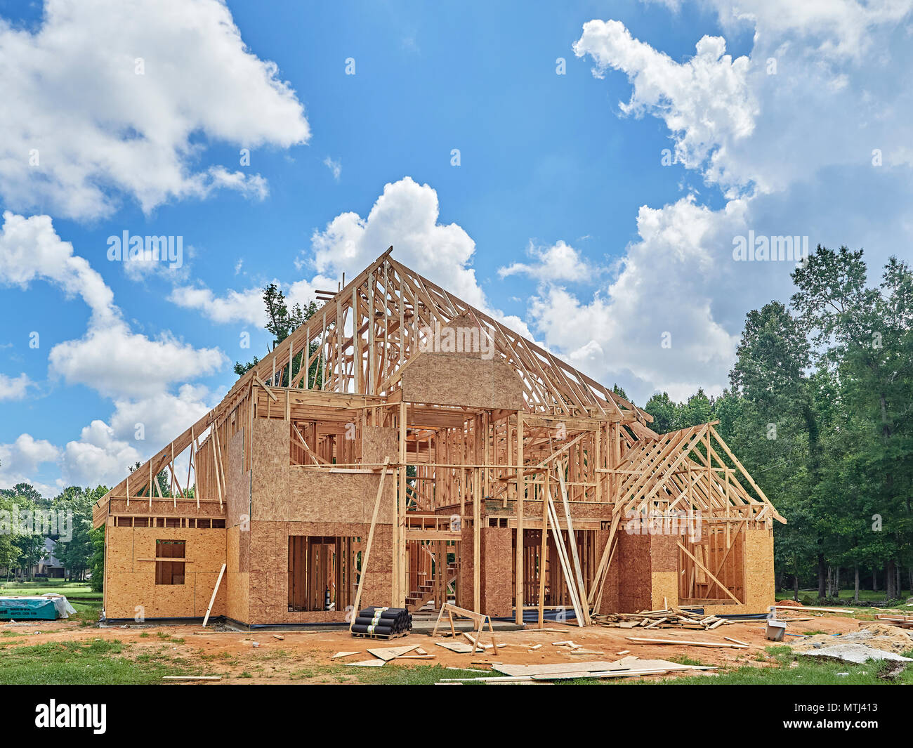 Exterior of framed residential house under construction in a subdivision in Montgomery Alabama, USA. Stock Photo