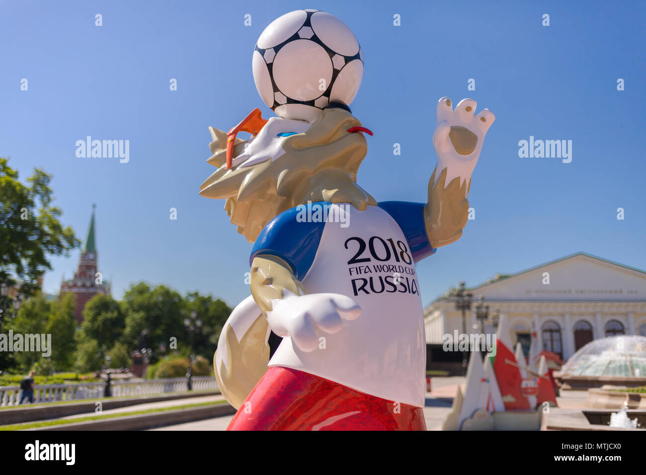 Official Mascot of FIFA 2018 World Cup in Russia - Zabivaka and Moscow Kremlin tower at background. Symbol of Football Stock Photo