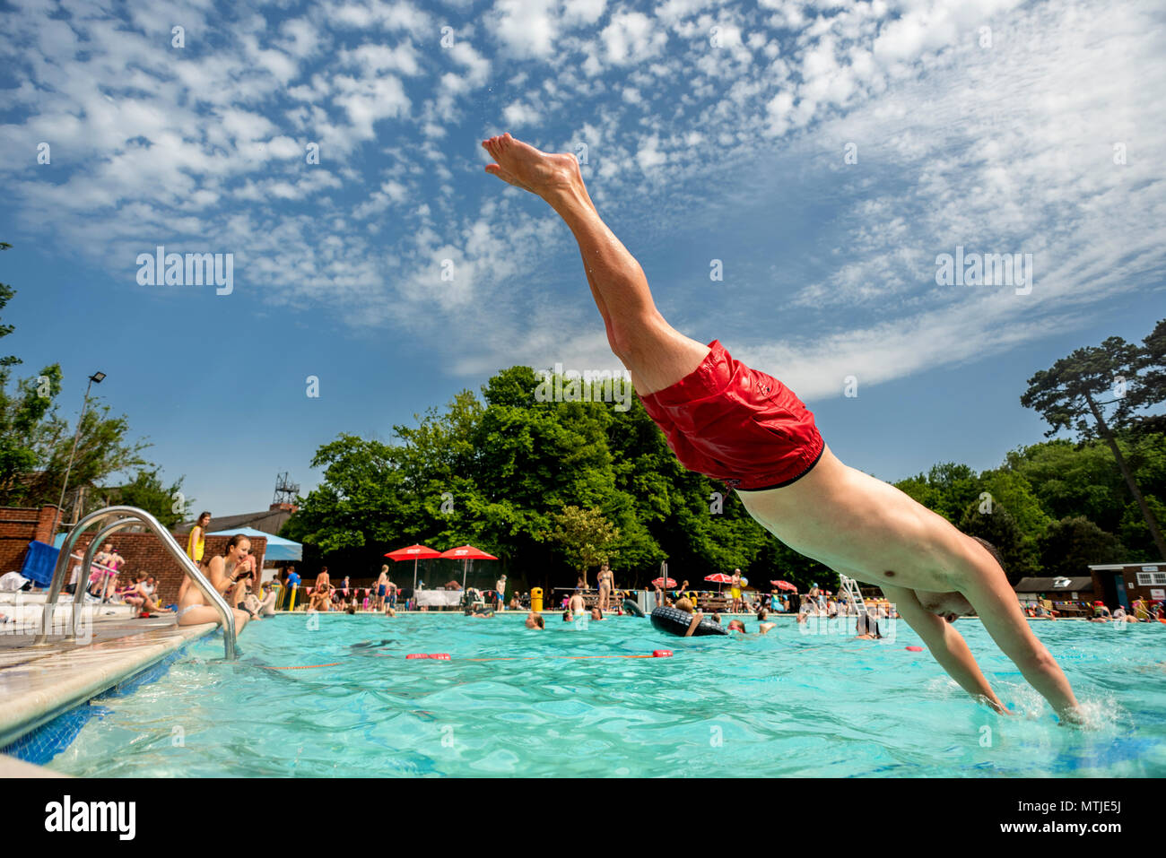 Pell's Pool in Lewes, East Sussex, the oldest documented freshwater outdoor public swimming pool in the UK, opening for the summer season Stock Photo