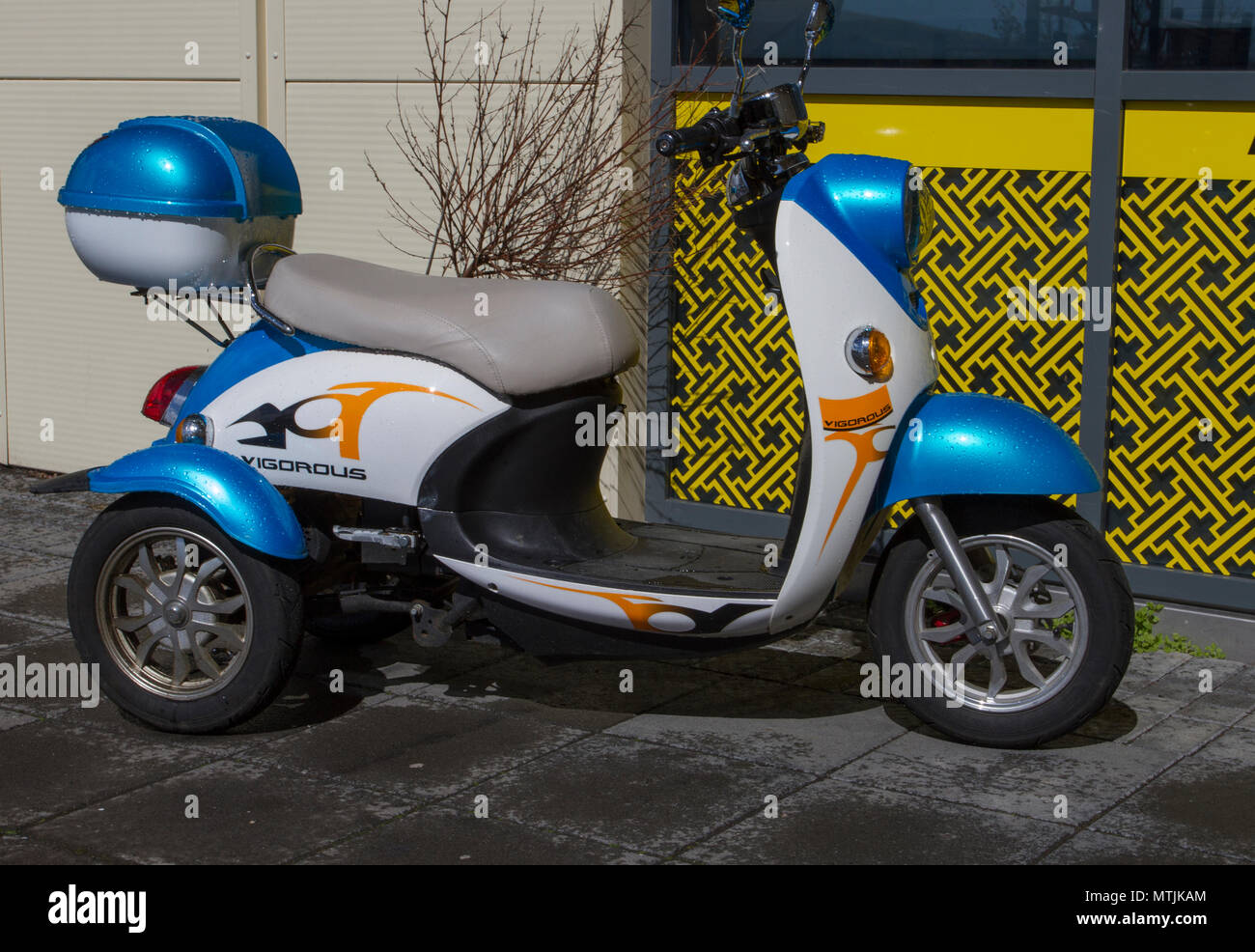 Blue Vigorous Scooter, electric tricycle in Iceland Stock Photo - Alamy