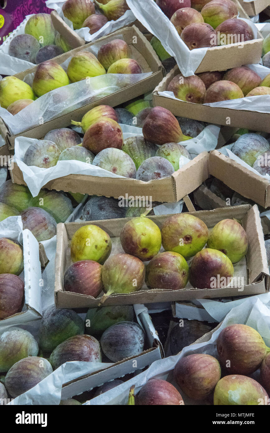fresh figs for sale on a market stall at borough market in London
