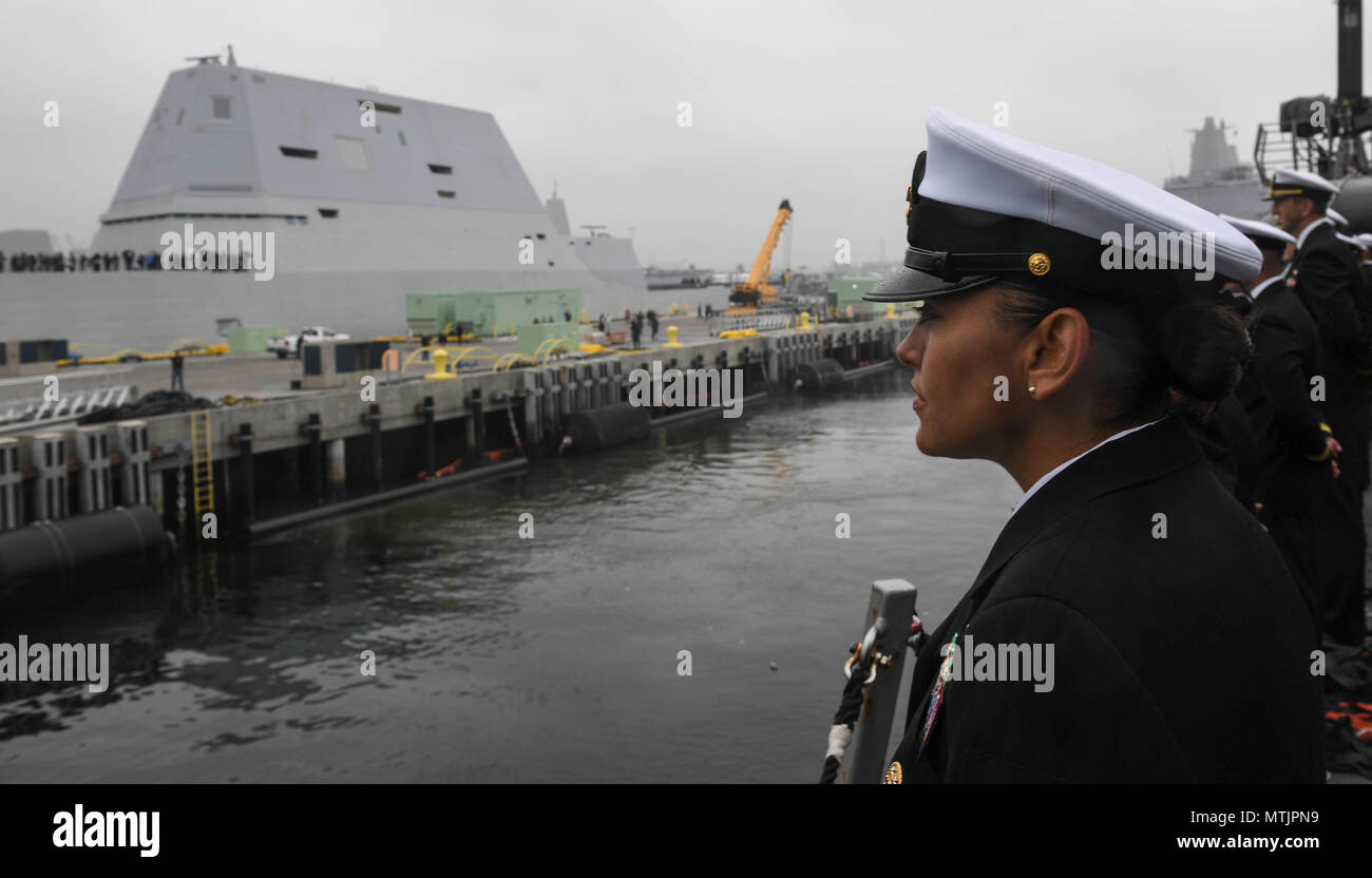 170105-N-RM689-150  SAN DIEGO (Jan. 05, 2017)- Command Master Chief Veronica Holliday, assigned to Arleigh Burke-class guided missile destroyer USS Wayne E. Meyer (DDG 108), mans the rails as the ship leaves for deployment. The Carl Vinson Carrier Strike Group will report to U.S. 3rd Fleet, headquartered in San Diego, while deployed to the Western Pacific as part of the U.S. Pacific Fleet-led initiative to extend the command and control functions of 3rd Fleet into the region. (U.S. Navy photo by Mass Communication Specialist 3rd Class Kelsey L. Adams/Released) Stock Photo
