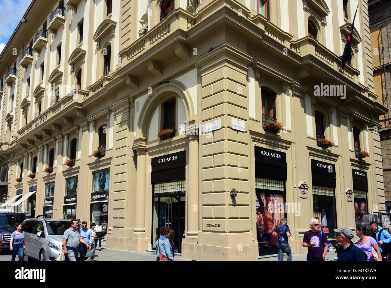 Florence, Italy - May 10, 2018: Coach, an American multinational luxury  fashion company, store in Piazza della Repubblica Stock Photo - Alamy