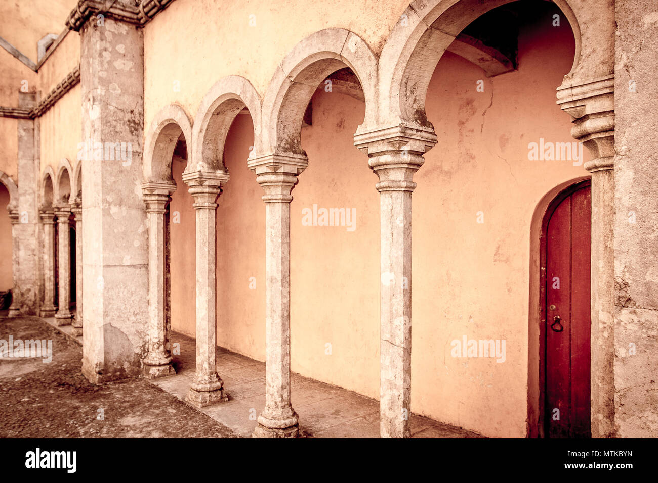 Gallery along a wall on the patio at Pena Palace in Sintra, Portugal. Stock Photo