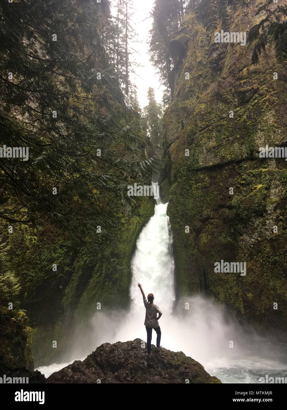 Feeling Great at Oregon Waterfall Stock Photo