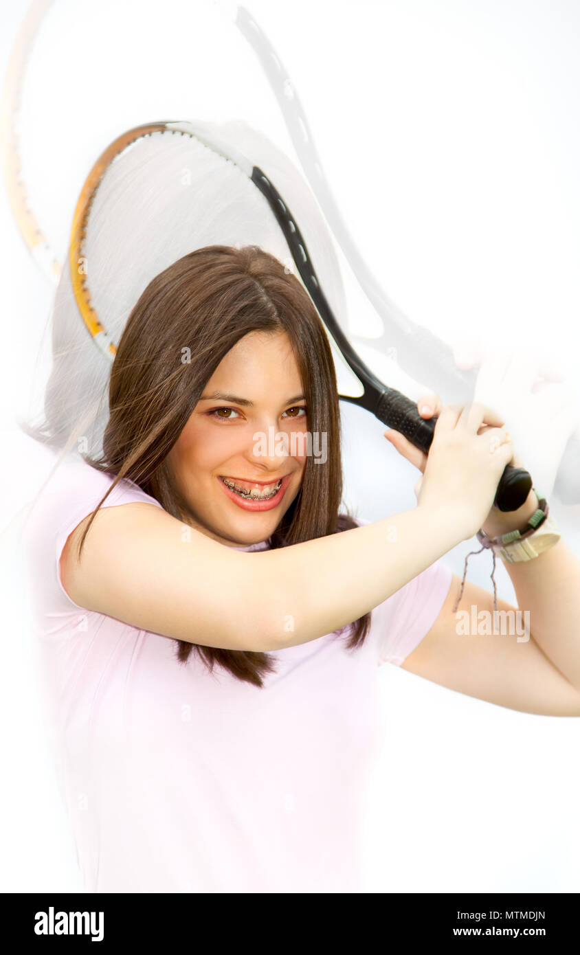 Ready to hit! Female tennis player with racket ready to hit a tennis ...