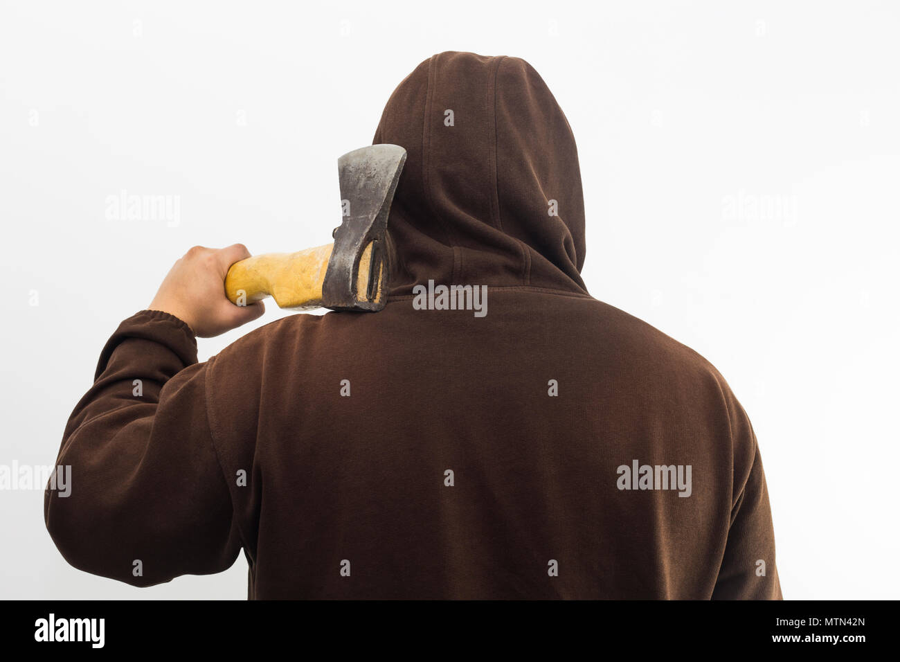 man with ax on his back on white background Stock Photo