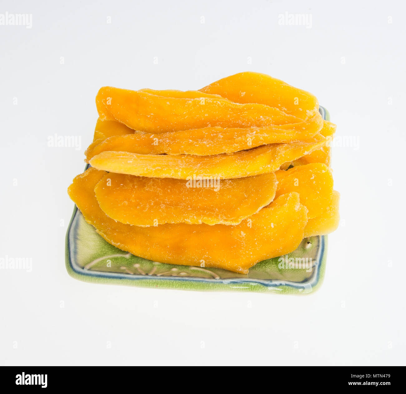 Dried Mango or Dried Mango slices on a background Stock Photo Alamy