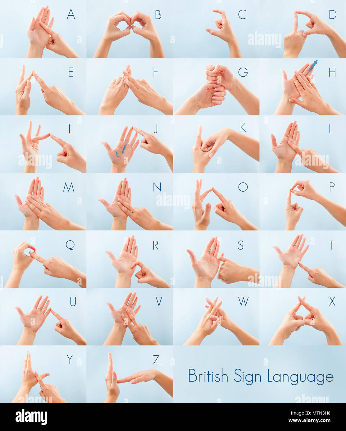 American sign language . Female hand showing letter D isolated on blue